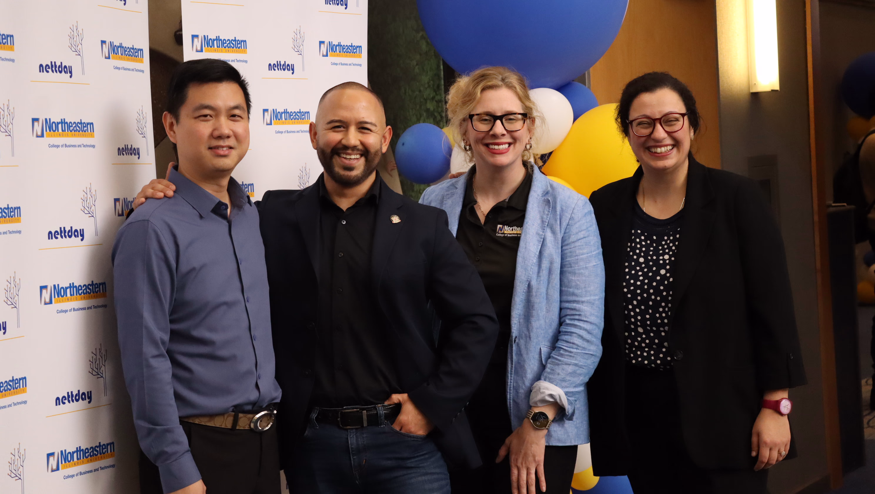 Fidel posing with the organizers of NATT day at NEIU.