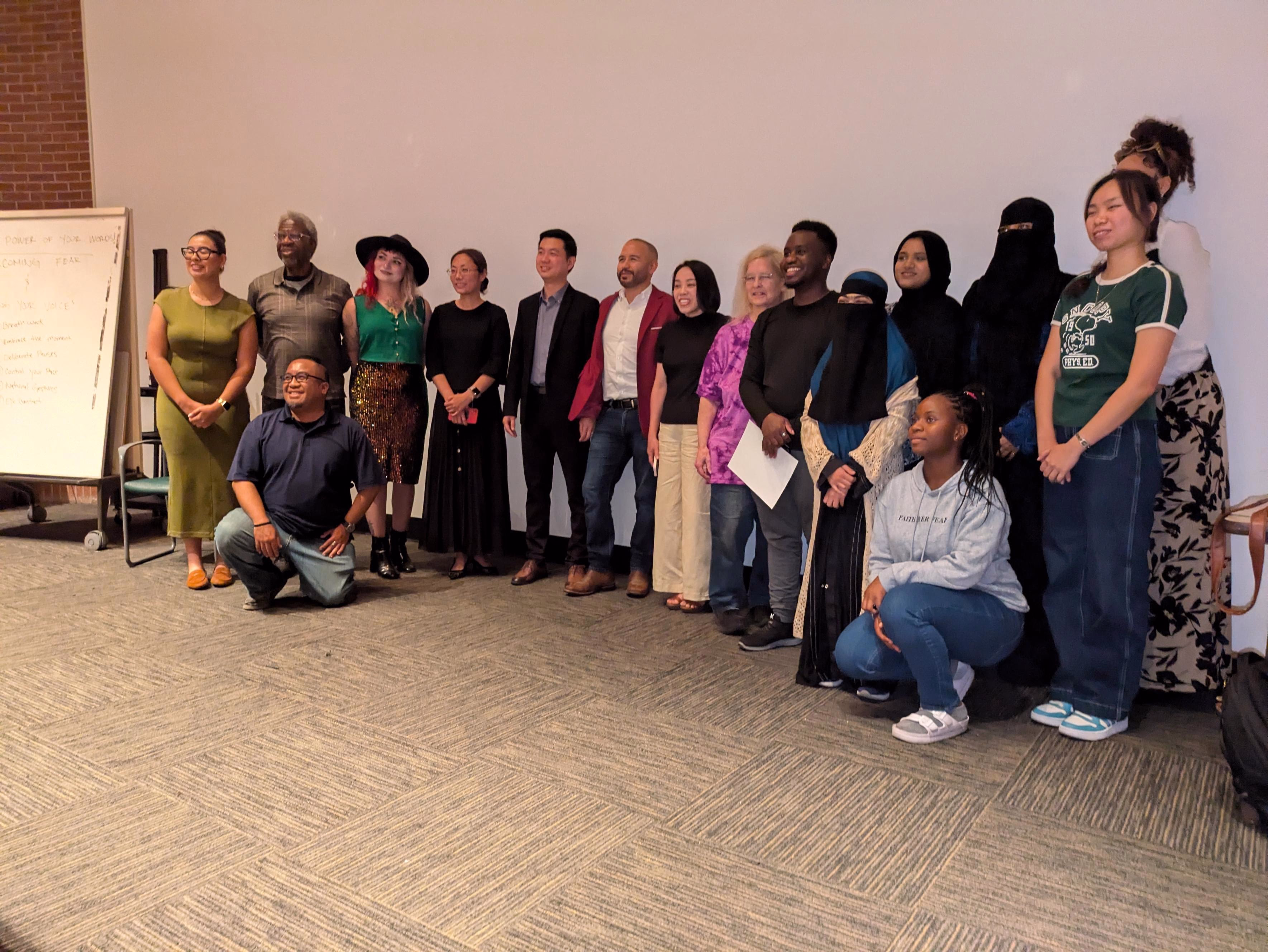 Fidel posing with his students after presenting his Speaking Skills workshop at Northeastern Illinois University with H.E.R.O Consulting Group.