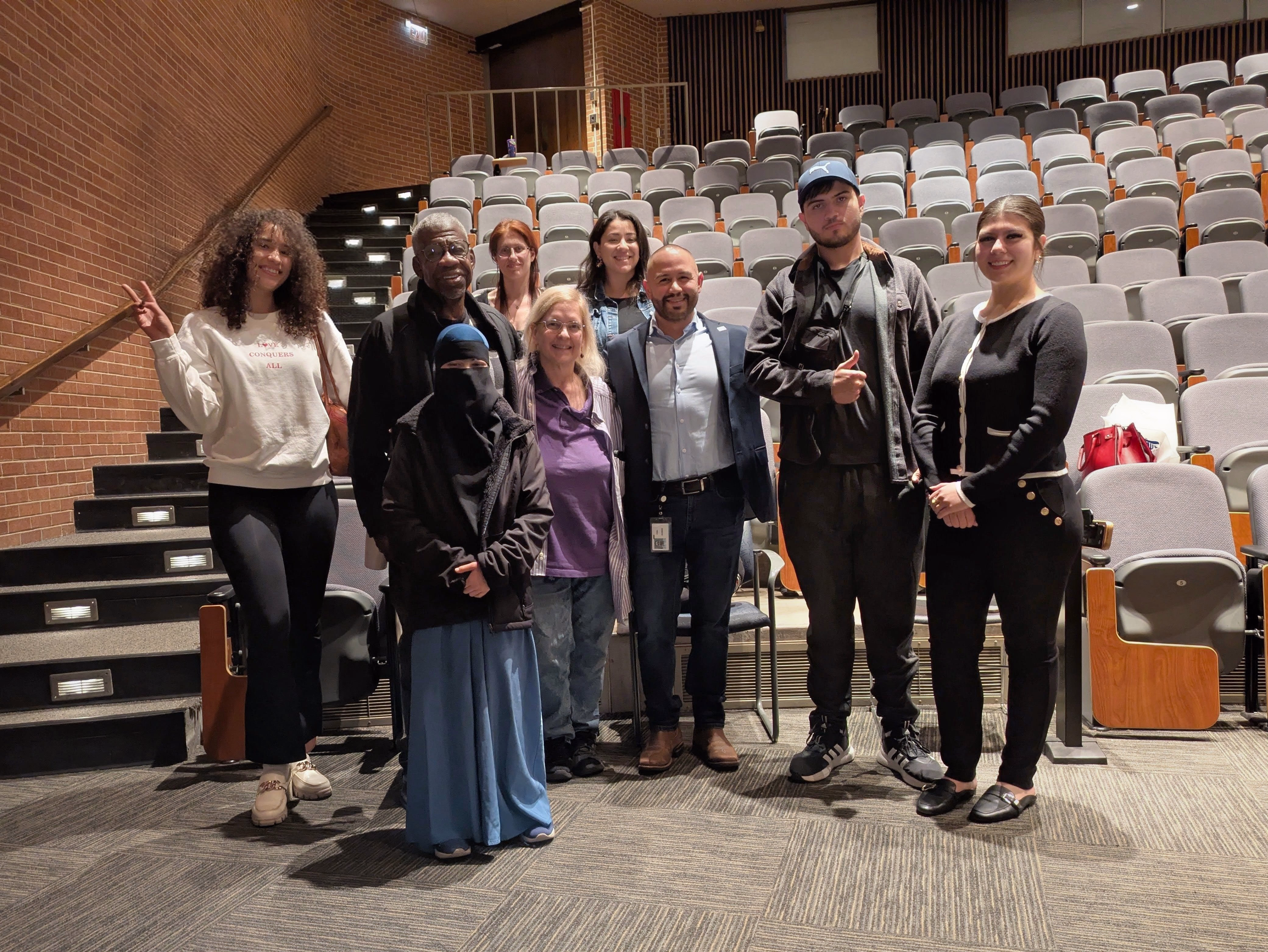 Fidel posing with his second group of students after presenting his Speaking Skills workshop at Northeastern Illinois University with H.E.R.O Consulting Group.